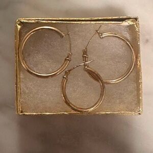 Three 10K gold earrings